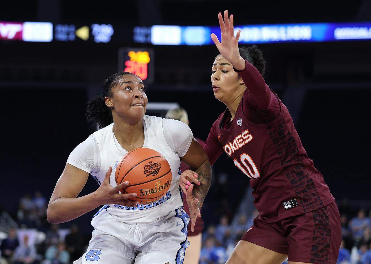 Nyla Harris (2) of the North Carolina Tar Heels drives against Carys Baker of the Virginia Tech Hokies during the second quarter of the teams’ Women’s ACC Tournament quarterfinal at Gas South Arena on March 6, 2026 in Duluth, Georgia.