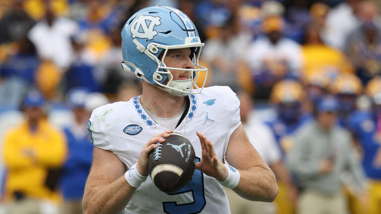 UNC quarterback catches ‘hotel breakfast’ stray on ESPN broadcast