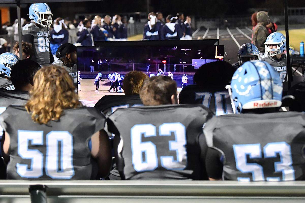 The Cleveland offense watches the replays of the game against Heritage on the sidelines.The Cleveland Rams and the Heritage Huskies met in the first round of the NCHSAA 4A playoffs in Clayton, N.C. on November 15, 2024.