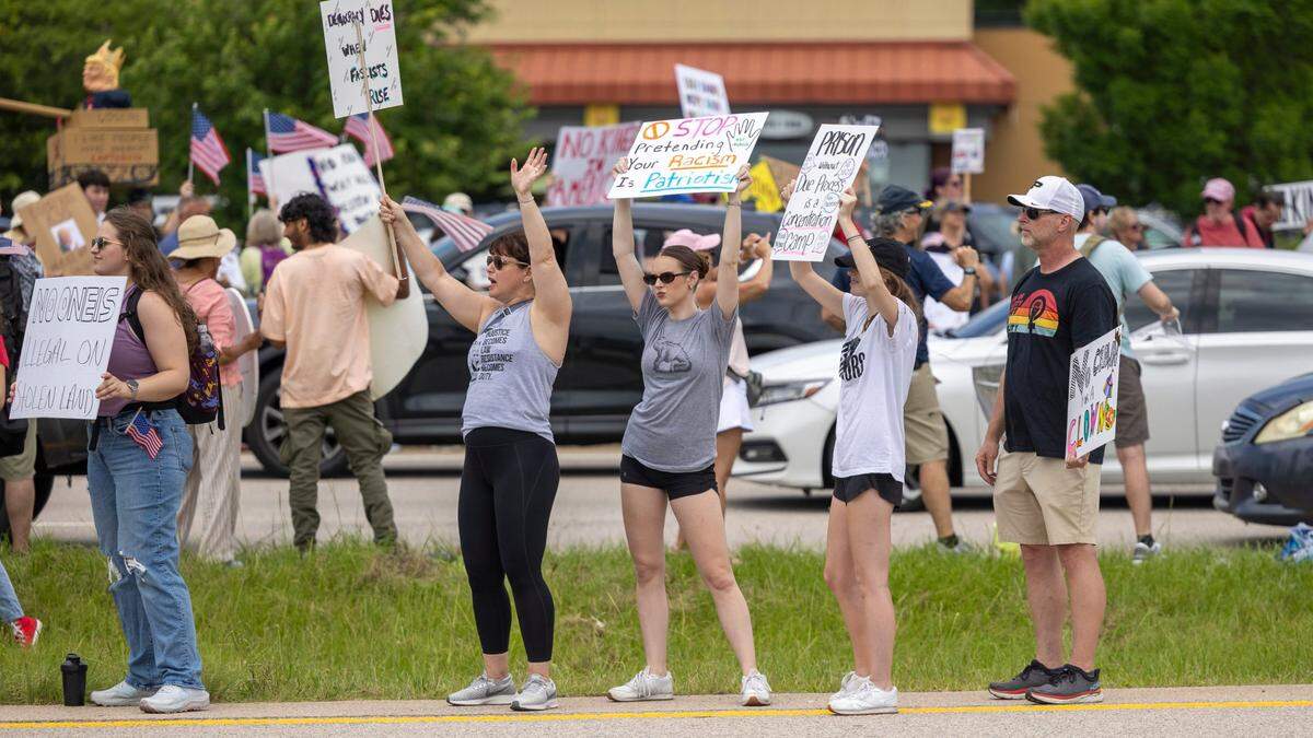 More than 1500 demonstrators lined Capital Boulevard to protest the policies and tactics of the of President Donald Trump on Saturday, June 14, 2025 near Triangle Town Center in Raleigh. The Raleigh “No Kings” rally was one of dozens across North Carolina and hundreds nationwide on what organizers called a nationwide day of defiance against the Trump administration.