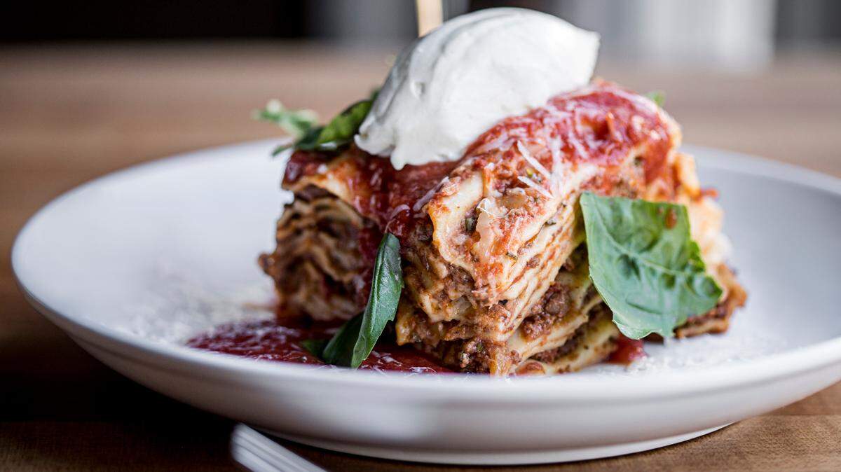 An endlessly layered lasagna is one of the shareable dishes on the menu at Colletta, the first restaurant to open in Cary’s Fenton development.