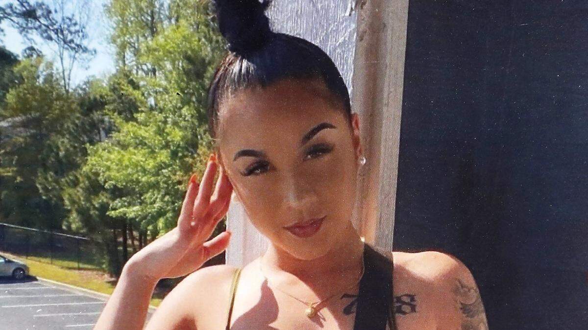 A detail from the memorial for Christina Matos outside the Signature 1505 apartments on Hillsborough Street in Raleigh, N.C., Friday, April 9, 2021. Matos was found dead in her apartment she shared with two roommates. Erick Gael Hernandez-Mendez, one of her roommates, has been charged with first-degree murder in her death.