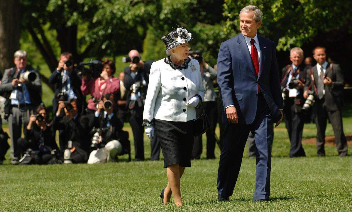Britain’s Queen Elizabeth II and the President George Bush walk through the gardens of the White House in Washington DC, Monday, May 7, 2007, during the official visit by the queen. In a slip of the tongue, President George W. Bush brought roars of laughter to a White House welcoming ceremony Monday for Queen Elizabeth II. The president stumbled on a line in his speech, saying that the queen had dined with 10 U.S. presidents and had helped the United States “celebrate its bicentennial in 17 ... .” Bush caught himself and corrected the date to 1976. He paused as if to see if the queen had taken offense.