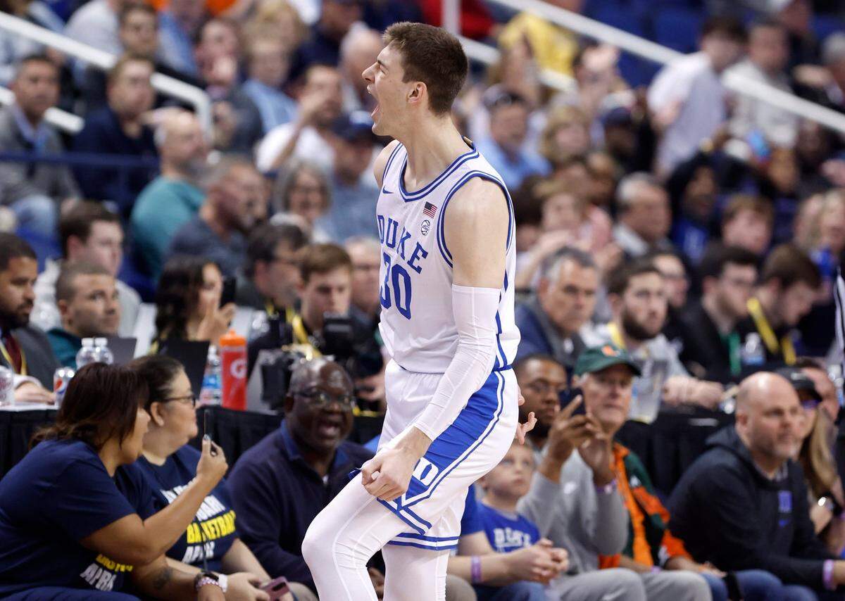 Duke’s Kyle Filipowski (30) celebrates after making a three-pointer during the first half of Duke’s game against Pitt in the quarterfinals of the ACC Men’s Basketball Tournament in Greensboro, N.C., Thursday, March 9, 2023.