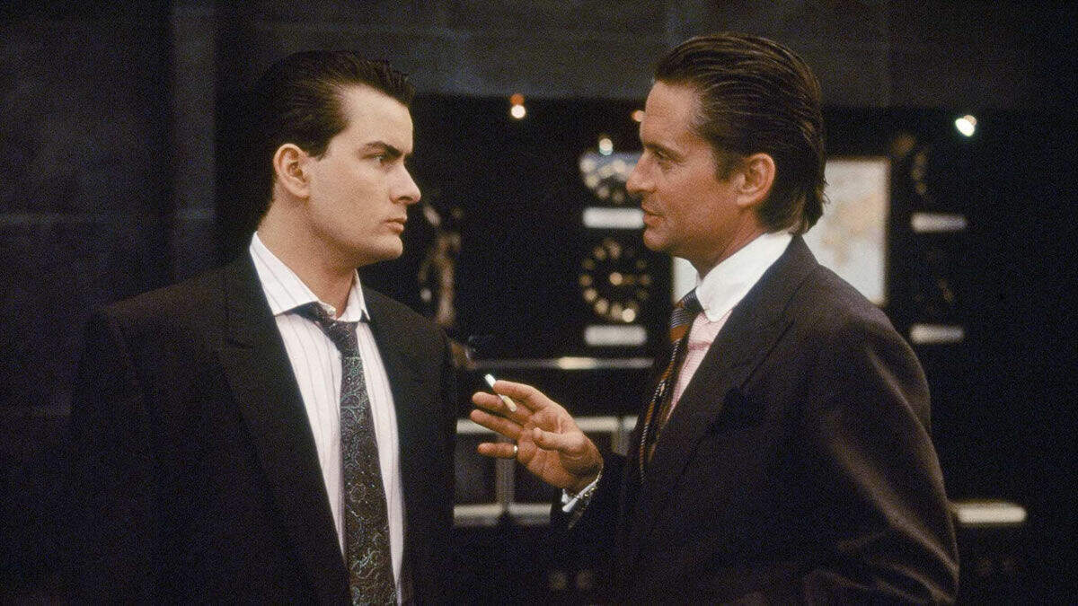 Bud Fox (Charlie Sheen) and Gordon Gekko (Michael Douglas) in the 1987 movie Wall Street.