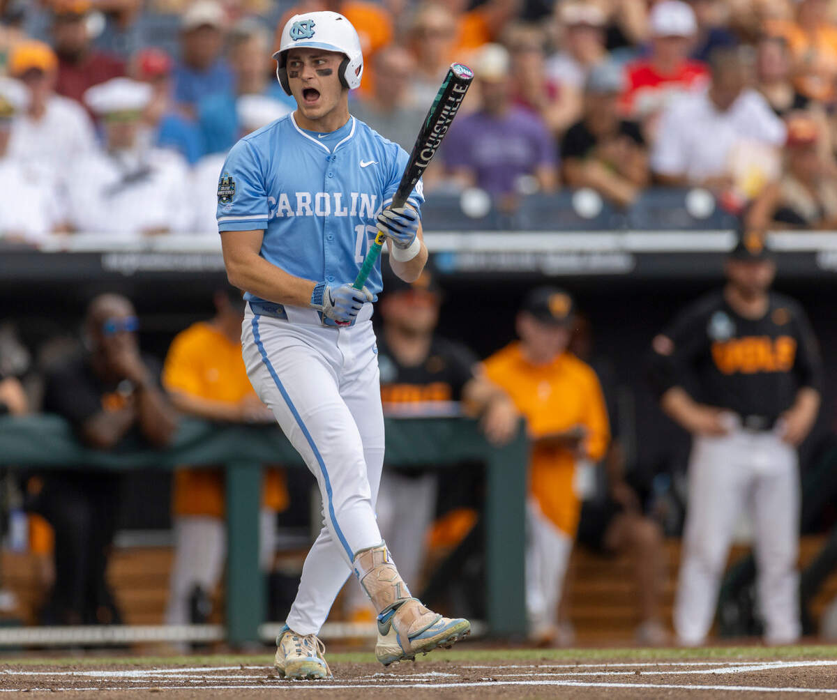 North Carolina left fielder Casey Cook (16) reacts after striking out in the first inning against Tennessee starting pitcher Drew Beam during the College World Series on Sunday, June 16, 2024 at Charles Swab Stadium in Omaha, Nebraska.