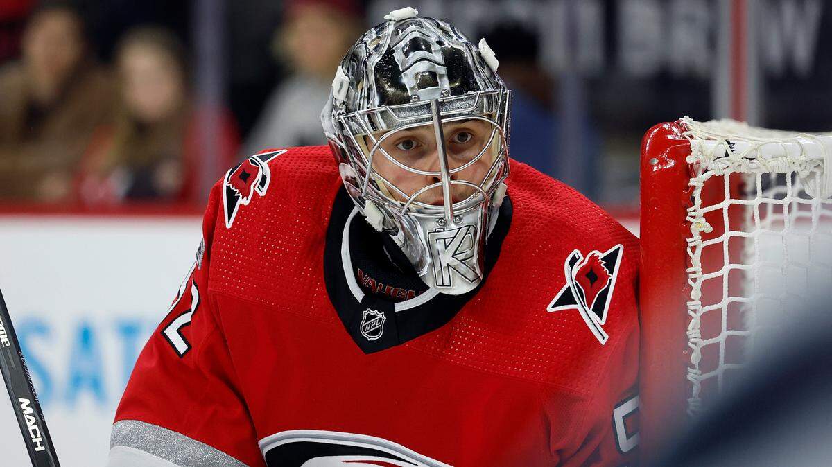 Carolina Hurricanes goaltender Pyotr Kochetkov (52) watches the puck against the Seattle Kraken during the third period of an NHL hockey game in Raleigh, N.C., Thursday, Dec. 15, 2022. (AP Photo/Karl B DeBlaker)