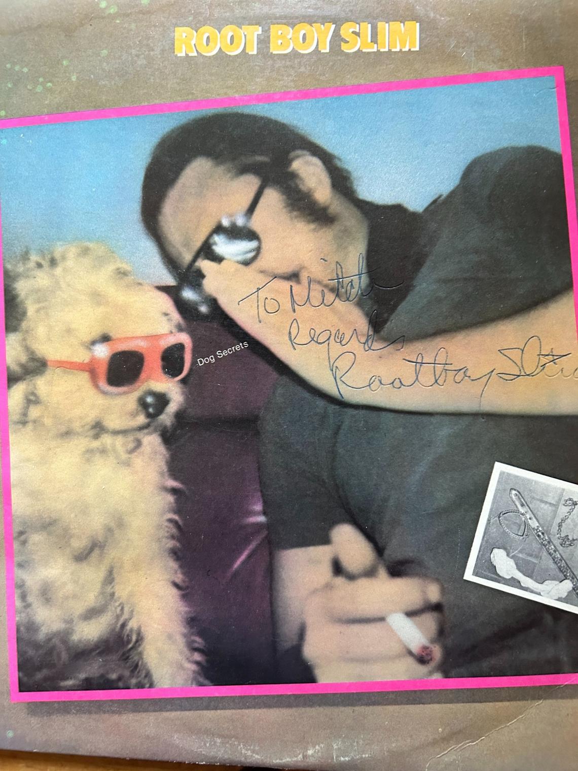The columnist’s autographed copy of Root Boy Slim’s “Dog Secrets” was purchased at Hunky Dory Records in Durham.