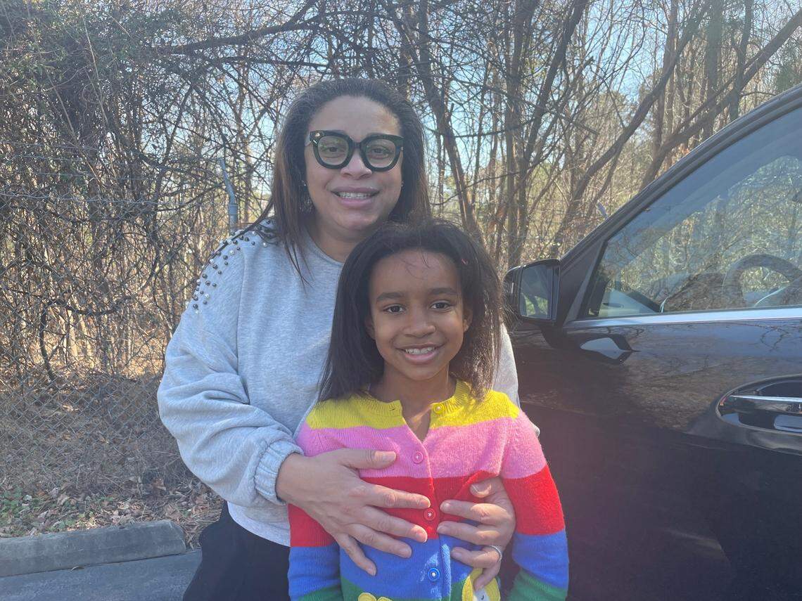 Takeila Hannah and her daughter, Tatum (8), came to Durham Technical Community College on Wednesday, March 2, 2022, hoping to see Vice President Kamala Harris.