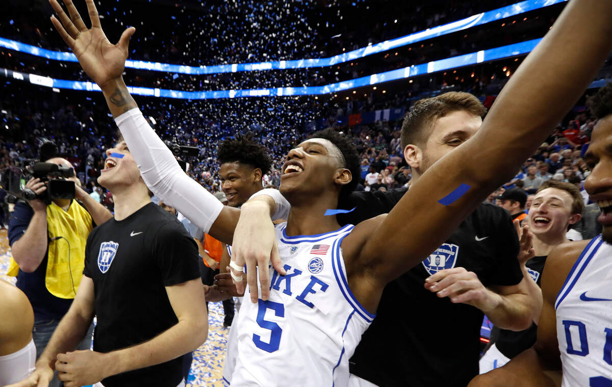 Duke’s RJ Barrett (5) celebrates with teammates after Duke’s 73-63 victory over Florida State in the finals of the 2019 ACC Tournament in Charlotte, N.C., Saturday, March 16, 2019.