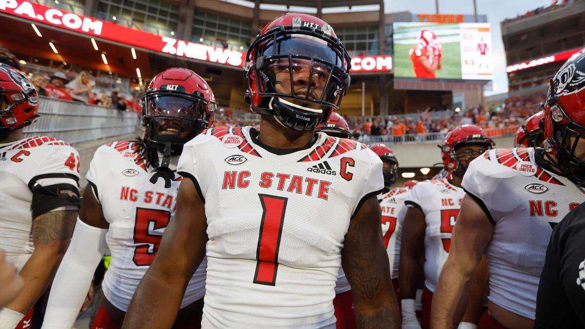 N.C. State linebacker Isaiah Moore (1) gets ready to head out onto the field to warmup before N.C. State’s game against Clemson at Memorial Stadium in Clemson, S.C., Saturday, Oct. 1, 2022.