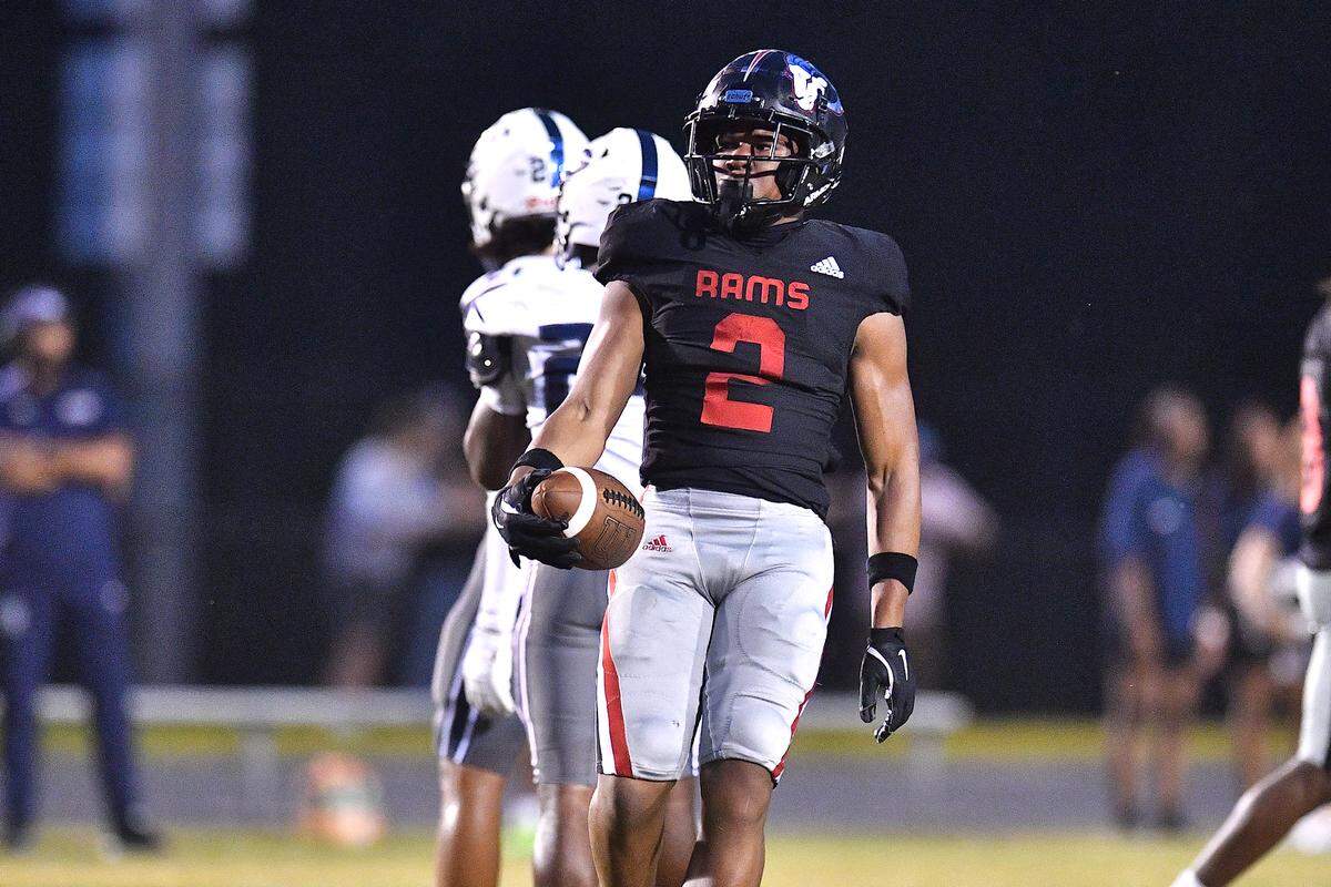 Rolesville running back Amir Brown (2) reacts to a play during the first half against Grimsley. The Rolesville Rams and the Greensboro Grimsley Whirlies met in a non-conference football game in Rolesville, N.C. on August 30, 2024. 