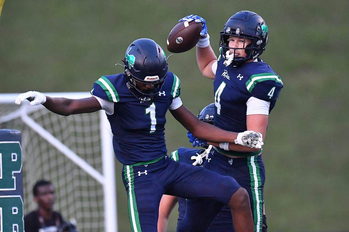 Leesville Road's Evan List (4) celebrates his touchdown against Heritage with Devin Goldston (1) during the first half. The Leesville Road Pride and the Heritage Huskies met in a football game in Raleigh, N.C. on September 5, 2025.