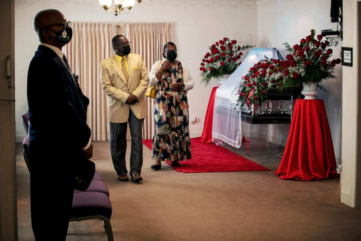 Edwin Newby and his wife Ella Newby of Edenton, N.C. pay their respects during visitation for Andrew Brown Jr. at Hortonís Funeral Home on Sunday, May 2, 2021 in Hertford, N.C.