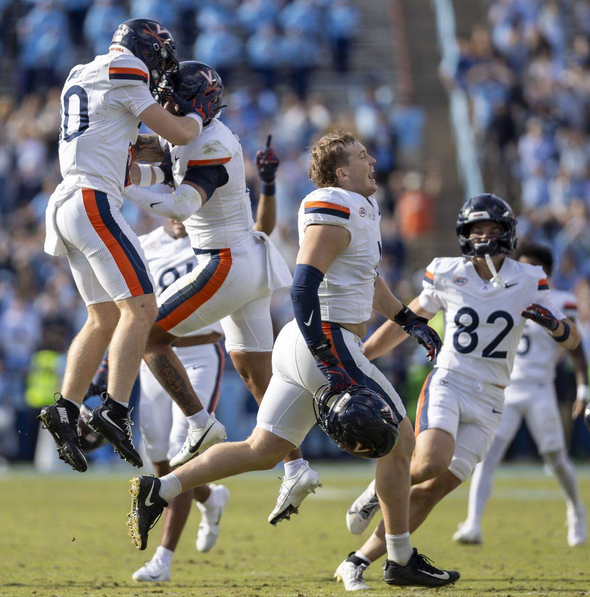 Virginia celebrates their 17-16 victory over North Carolina after preventing a two-point conversion in overtime on Saturday, October 25, 2025 at Kenan Stadium in Chapel Hill, N.C. 