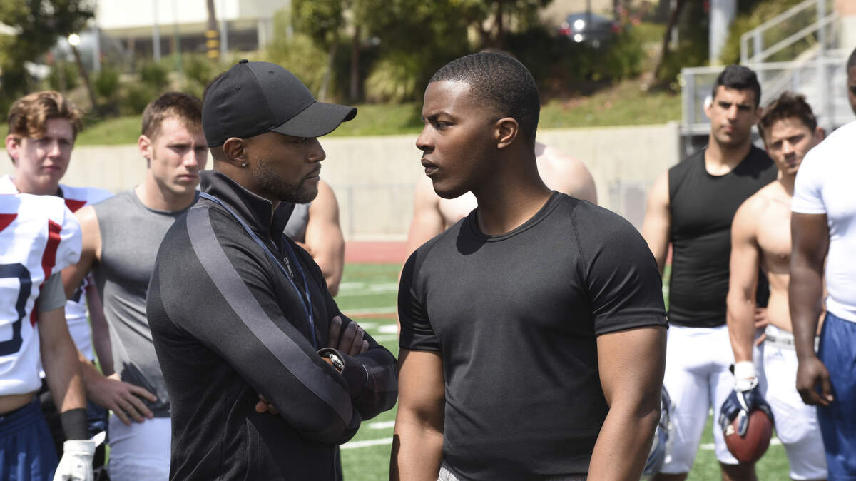 Taye Diggs, left, as Billy Baker and Daniel Ezra as Spencer James in “All-American” on The CW.