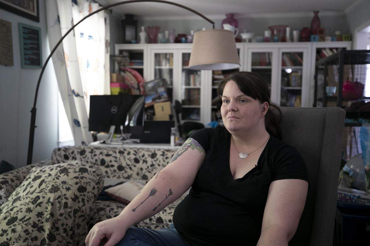 Shannon Dingle talks about the loss of her husband Lee Dingle who died after a wave struck him breaking his neck while playing with his children during their vacation at Oak Island in the summer of 2019. Dingle talks about the challenges of raising her six children alone during an interview at her home on Friday, August 30, 2019 in Raleigh.