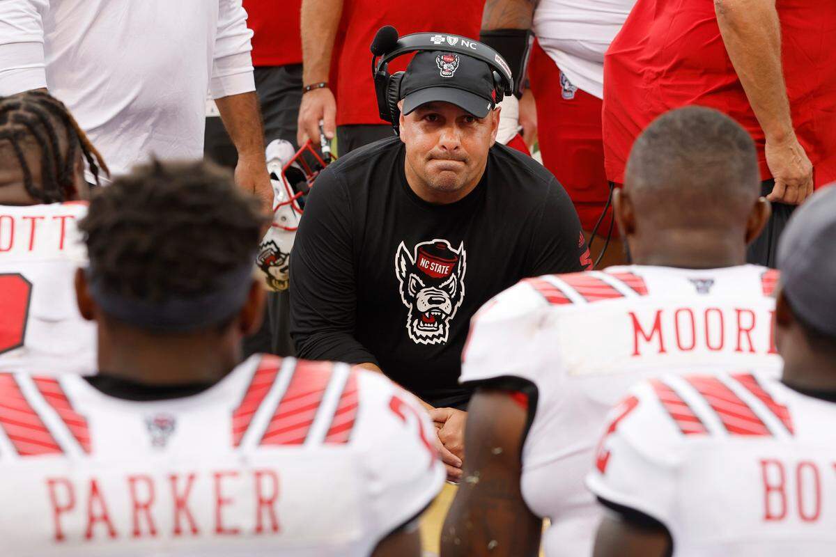 N.C. State defensive coordinator Tim Beck talks with his team during the second half of N.C. State’s 21-20 victory over ECU at Dowdy-Ficklen Stadium in Greenville, N.C., Saturday, Sept. 3, 2022.