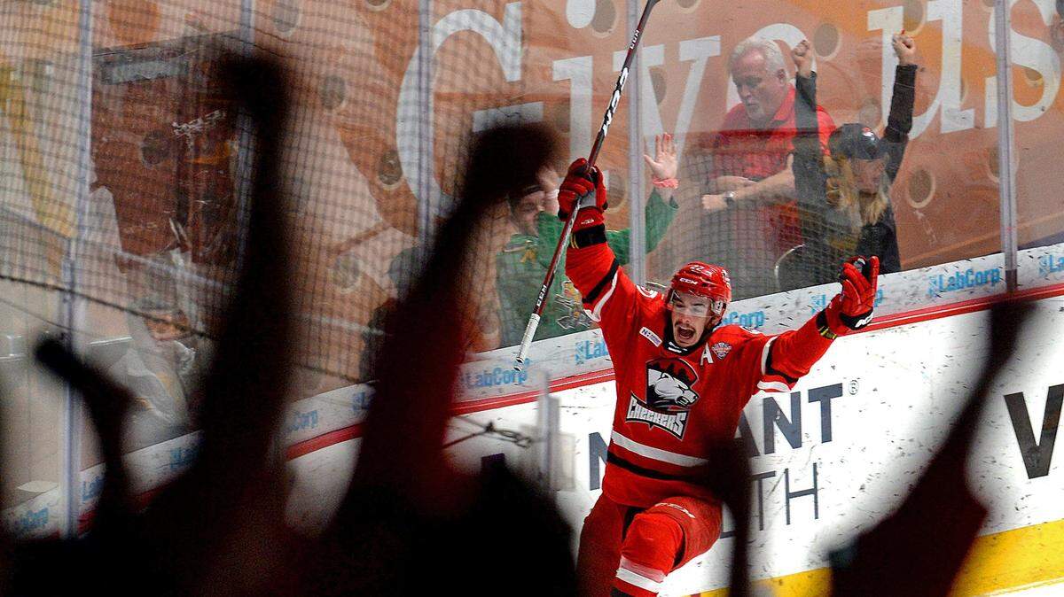 Charlotte Checkers Andrew Poturalski celebrates a goal against the Chicago Wolves during first period action on Saturday, June 1, 2019 at Bojangles’ Coliseum in Charlotte, NC. At the end of first period action, the Checkers led the Wolves 3-1.