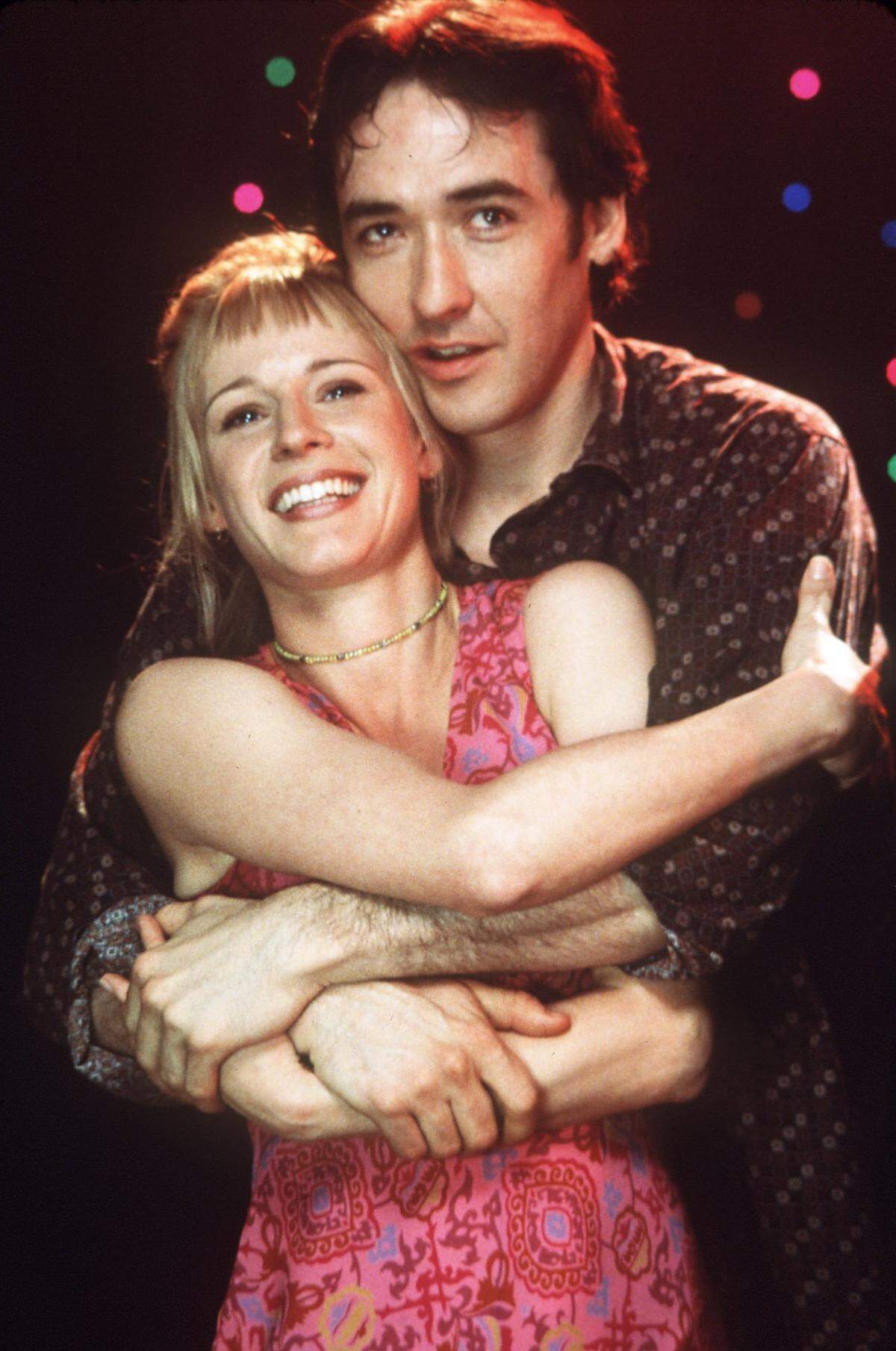 Iben Hjejle and John Cusack star in “High Fidelity.”