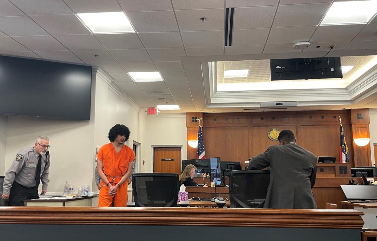 Issiah Ross, 19, enters an Orange County Superior courtroom on Tuesday, March 11, 2025. Ross has pleaded not guilty in the 2023 murders of Lyric Woods, 14, and Devin Ross, 18. He will face at Oct. 27 jury trial.