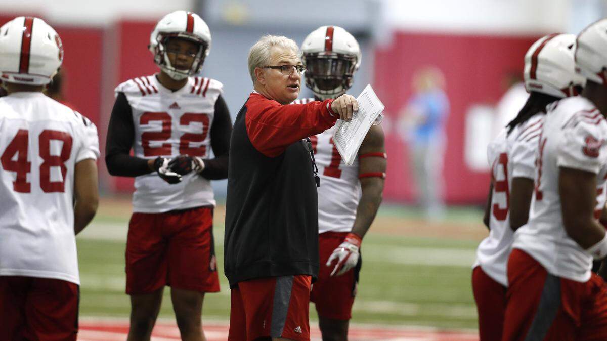 Ted Roof, N.C. State’s co-defensive coordinator and safeties coach, instructs players during N.C. State football’s first spring practice at the Close-King Indoor Practice Facility in Raleigh, N.C., Sunday, Feb. 25, 2018.