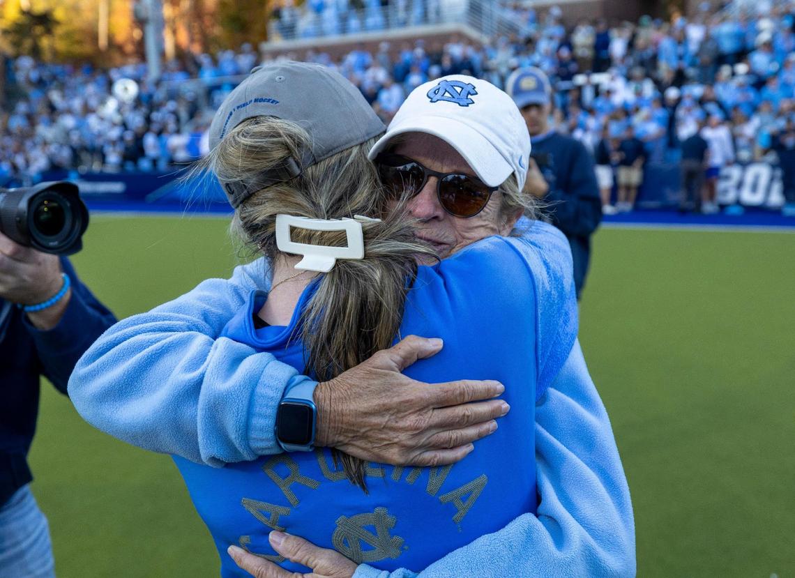 Former North Carolina field hockey coach Karen Shelton embraces coach Erin Matson following the Tar Heels’ victory over Northwestern in the NCAA Division I Field Hockey Championship on Sunday, November 19, 2023 at Karen Shelton Stadium in Chapel Hill, N.C. Matson who won the NCAA Championship for North Carolina last season as a player, earned her first as a head coach.