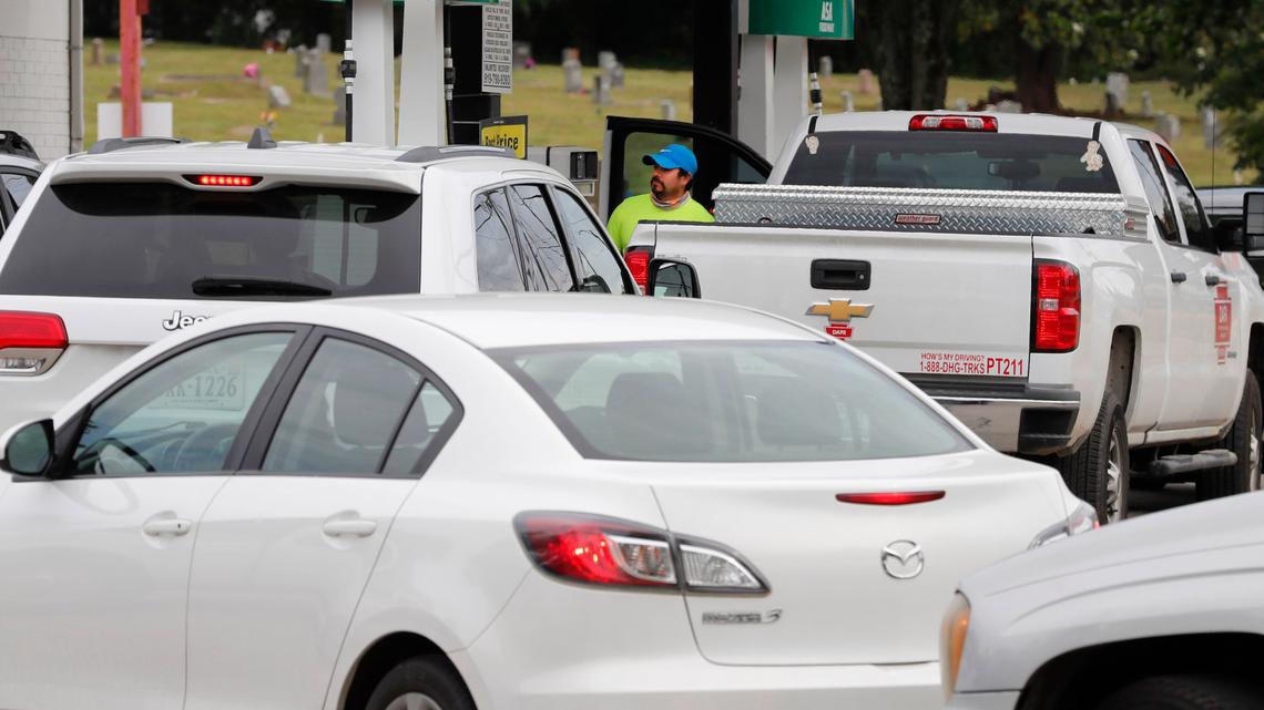 Customers line up to get gas at the ASA Food Mart on Garner Road zin Raleigh, N.C., Tuesday, May 11, 2021.