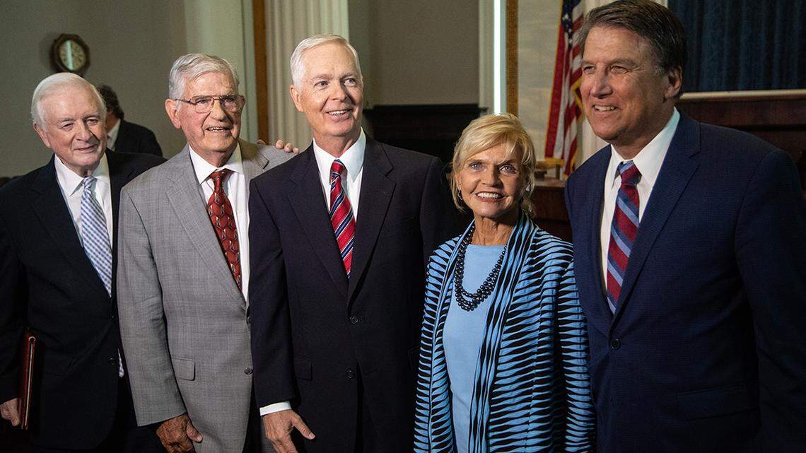 Former North Carolina governors from left, Jim Hunt, Jim Martin, Mike Easley, Bev Perdue and Pat McCrory speak during a press conference opposing proposed amendments to the North Carolina Constitution Monday, August 13, 2018 at the North Carolina State Capitol.