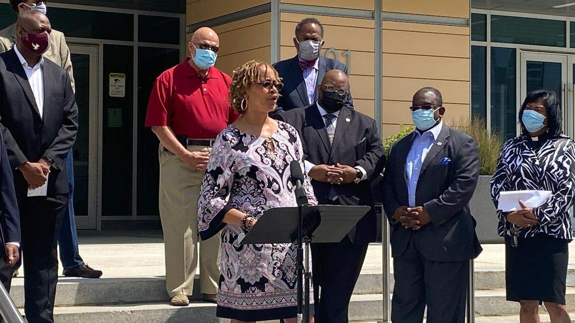 Elaine O’Neal, a former judge and chair of Durham’s Racial Equity Task Force, called for accountability from elected officials on allegations of racial bias at Wednesday’s press conference, standing in front of a county administration building.