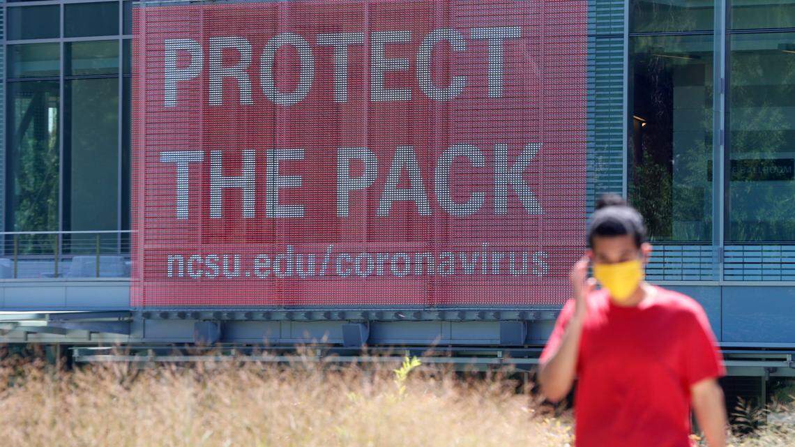 A large screen outside Talley Student Union reminds people to be mindful of coronavirus Friday, July 31, 2020.