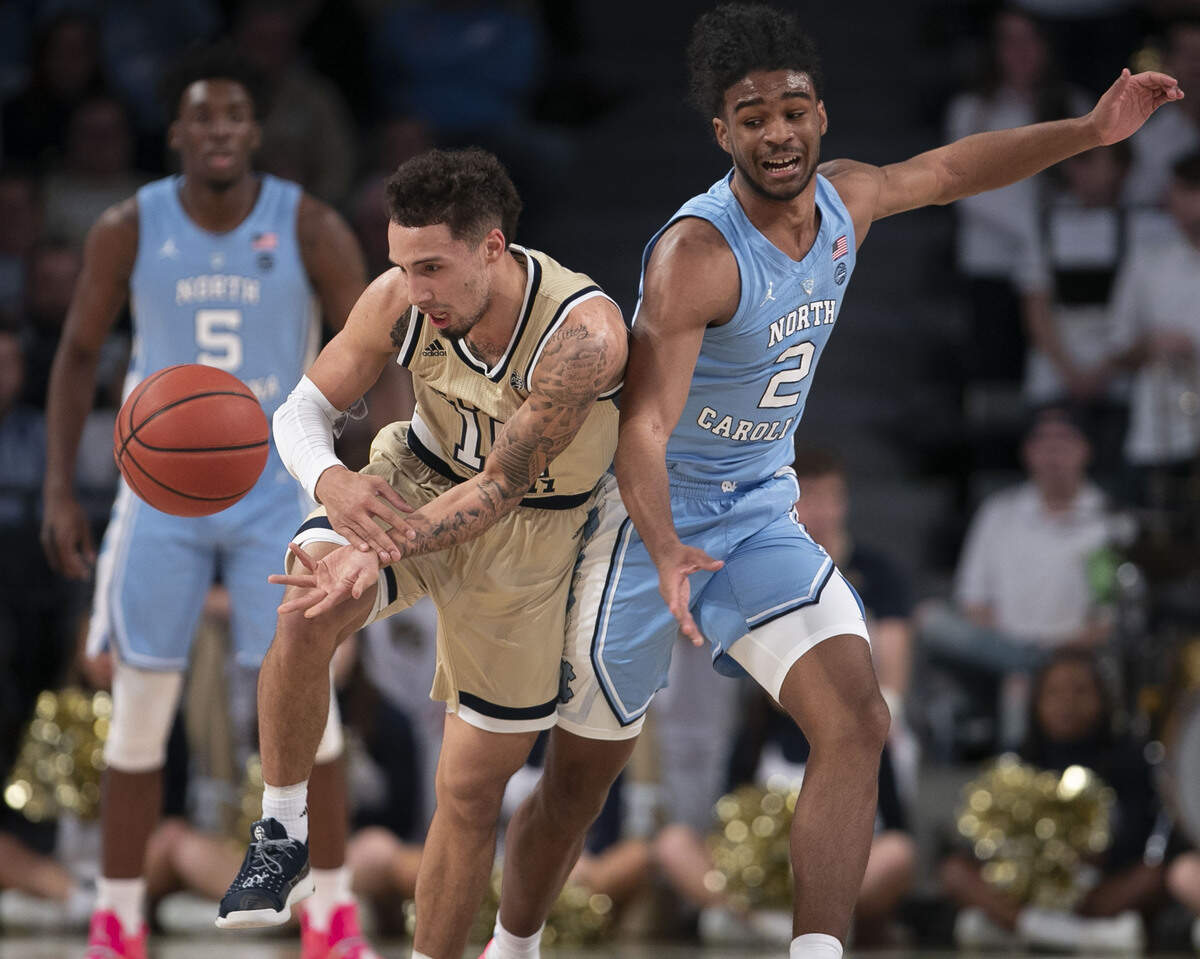 North Carolina’s Coby White (2) forces a turnover by Georgia Tech’s Jose Alvarado (10) during the first half on Tuesday, January 29, 2019 at McCamish Pavillion in Atlanta, Georgia.