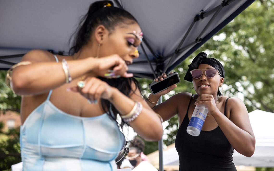 Jessianna Reed, left, and Jada Rhones dance during Durag Fest 2021 in Charlotte, on Saturday, June 19, 2021.