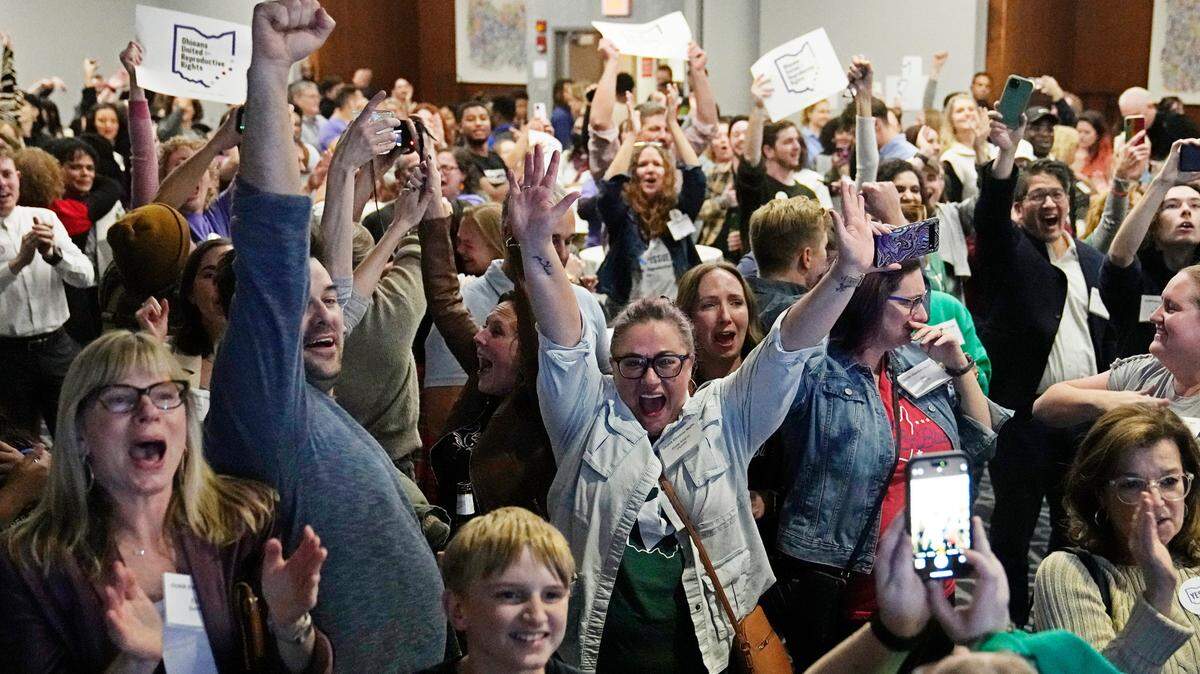 A crowd cheers in Columbus, Ohio on Nov. 7, 2023, as they watch results come in. Ohio voters approved a constitutional amendment that guarantees the right to abortion. The citizen-sponsored measure allowed voters, not the legislature, to decide the issue.