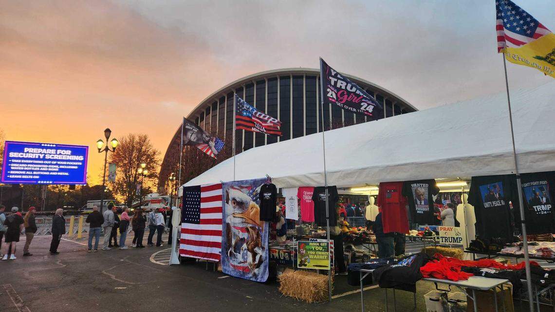 The sun rises behind Dorton Arena on the North Carolina State Fairgrounds early Monday morning, Nov. 4, 2024, the day before Election Day and hours before former President Donald Trump was set to speak at his third campaign rally in a row in the swing state.