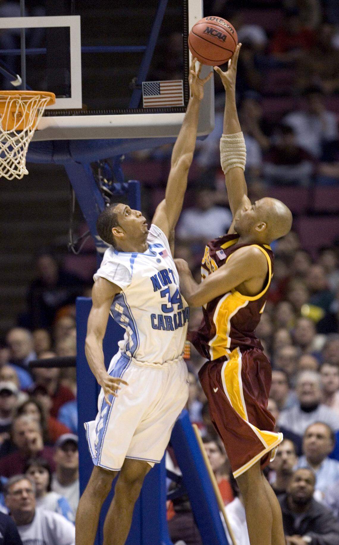UNC’s Brandan Wright (34) blocks a shot by USC’s Taj Gibson (22) during the Tar Heels’ victory in,2007 at the Continental Airlines Arena.