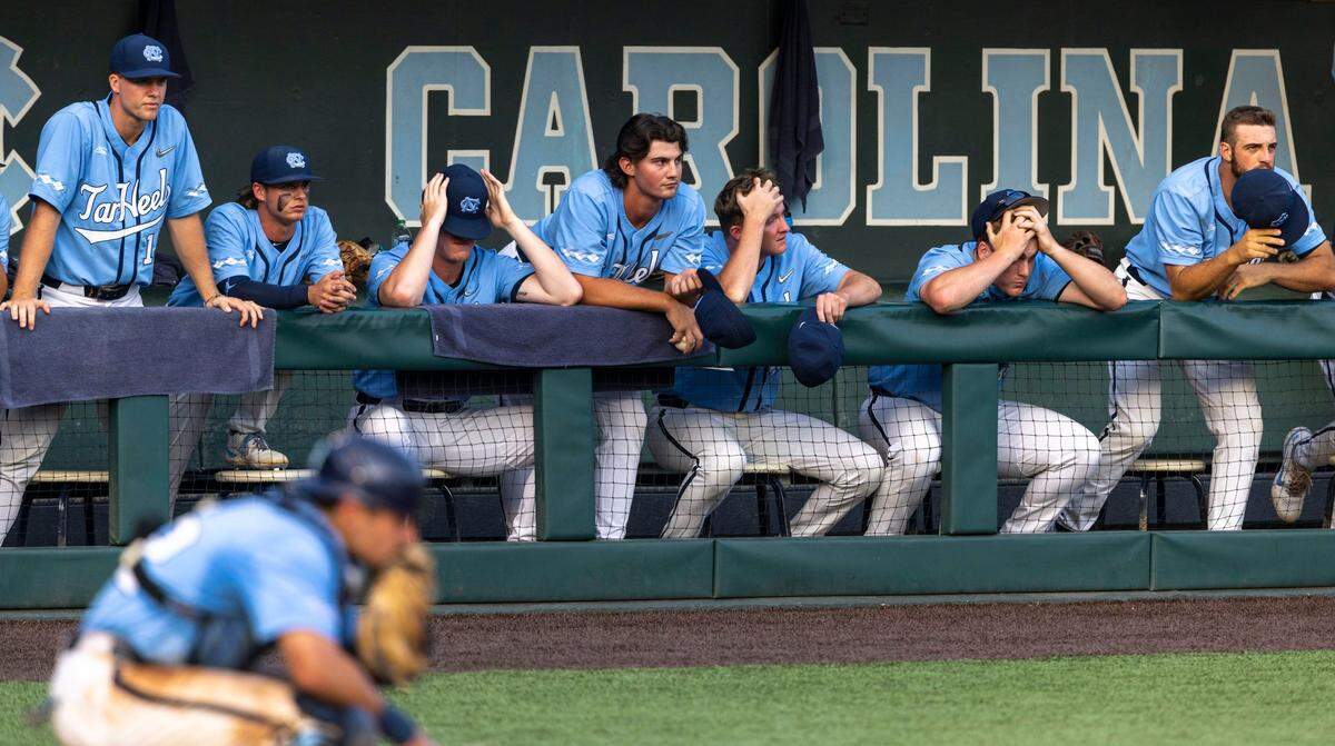 The North Carolina baseball team reacts as Arkansas scores the game winning run in the bottom of the ninth inning securing a 4-3 victory and clinching the NCAA Super Regional series on Sunday, June 12, 2022 at Boshamer Stadium in Chapel Hill, N.C.