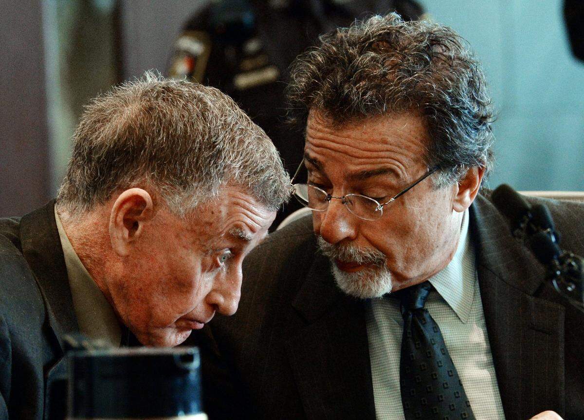 Michael Peterson (left) confers with his defense attorney David Rudolf during his hearing where he took an Alford plea in what is the end of a 15 year murder case at the Durham County Courthouse, in Durham, N.C. Friday, Feb. 24, 2017. Peterson took an Alford plea to a charge of voluntary manslaughter in the death of his wife Kathleen Peterson on Dec. 9, 2001. Taking an Alford plea, a defendant can maintain his or her innocence while acknowledging prosecutors have enough evidence for a conviction. During a press conference afterwards Peterson and Rudolf maintained Peterson’s innocence and claimed malfeasance by the Durham police department and SBI as the reasons for his convictions.