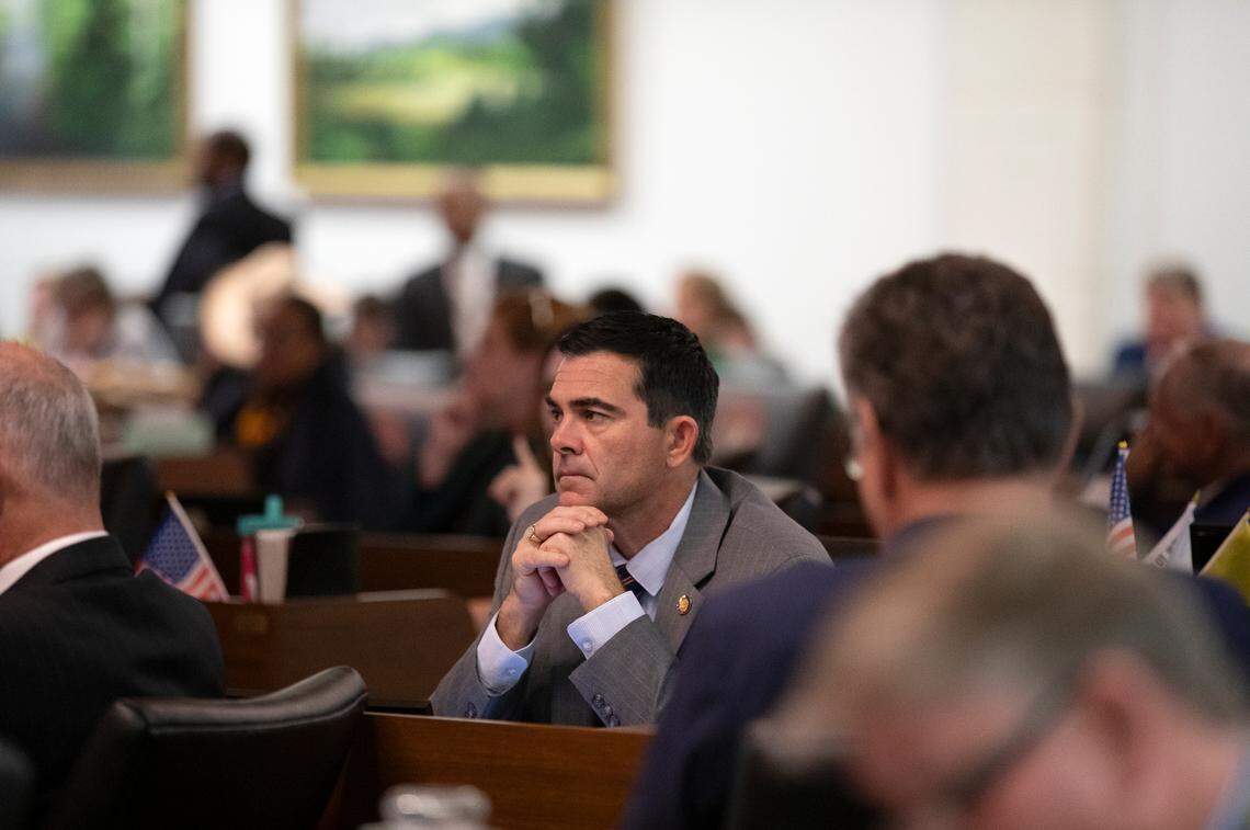 Rep. John Bradford, a Republican from Mecklenburg County, listens as a bill including a series of power shifts is debated during a legislative session at the General Assembly on Tuesday, Nov. 19, 2024, in Raleigh, N.C.