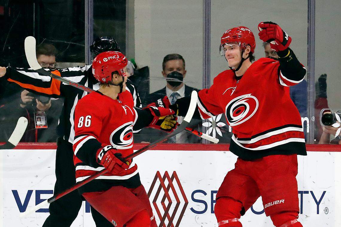 Carolina Hurricanes’ Andrei Svechnikov (37) celebrates his goal with teammate Teuvo Teravainen (86) during the third period of an NHL hockey game against the Chicago Blackhawks in Raleigh, N.C., Tuesday, May 4, 2021. (AP Photo/Karl B DeBlaker)