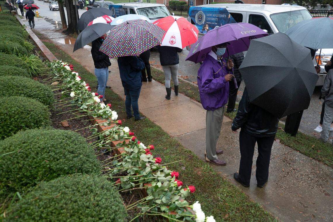 St. Augustine’s University students and faculty placed roses at the home of University President Irving McPhail on Oakwood Avenue on Friday, October 16, 2020 in Raleigh, N.C. after learning of his death Thursday from COVID-19.