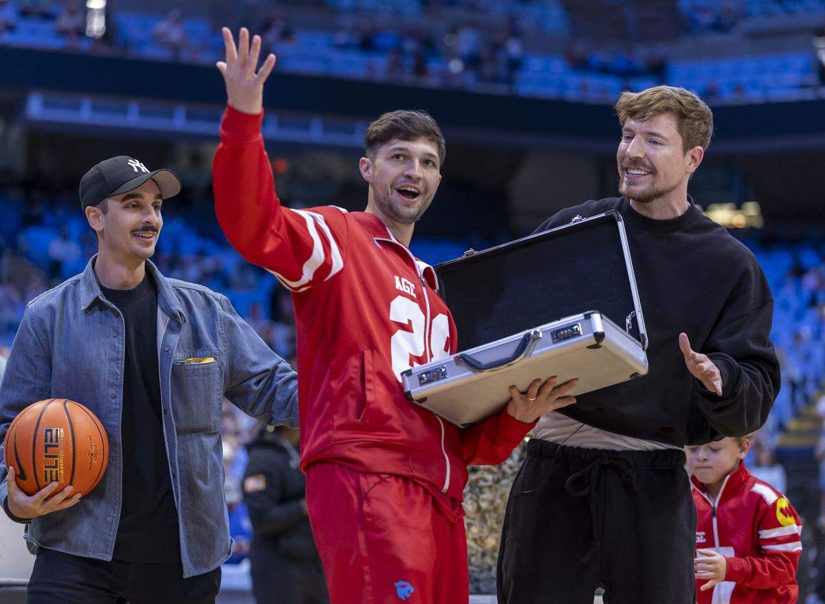 Tyler Gordon of Charlotte, N.C. wins $250,000 during a contest held by Jimmy Donaldson, the YouTube Influencer MrBeast on Saturday, December 13, 2025 at the Smith Center in Chapel Hill, N.C