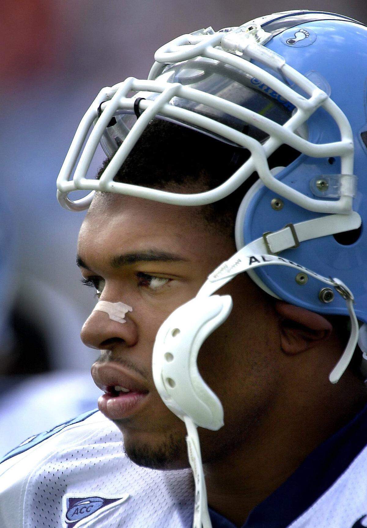 UNC defensive end Julius Peppers on the sidelines during a game in 2000.