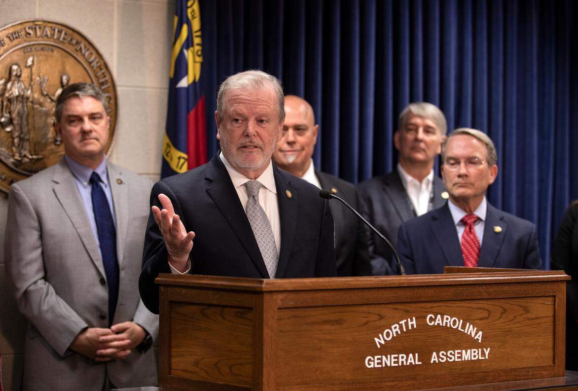 Senate leader Phil Berger, center, speaks about the introduction of legislation to restructure the State Board of Elections during a press conference at the Legislative Building on Monday, June 12, 2023, in Raleigh, N.C.