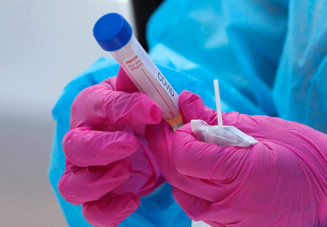 A COVID-19 test is prepared at Advance Community Health’s mobile pop-up testing site at Abundant Life Cathedral in Raleigh, N.C., Thursday, June 25, 2020. Tests were free and subjects will get their results within 48 hours.