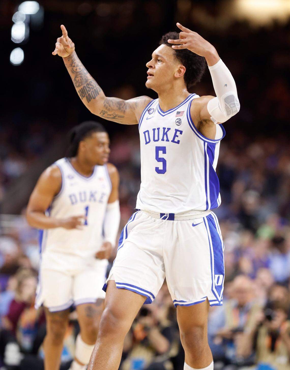 Dukes Paolo Banchero (5) celebrates hitting a three-pointer during the first half of Dukes game against UNC in the Final Four at Caesars Superdome in New Orleans, La., Saturday, April 2, 2022.