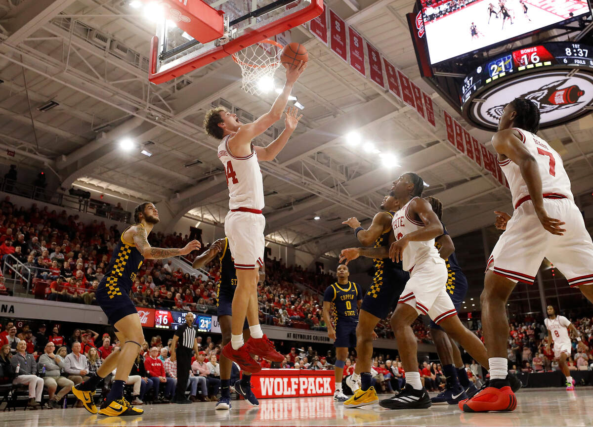 N.C. State’s Ben Middlebrooks lays the ball up during the first half of the Wolfpack’s 66-56 win over Coppin State on Tuesday, Dec. 10, 2024, at Reynolds Coliseum in Raleigh, N.C.