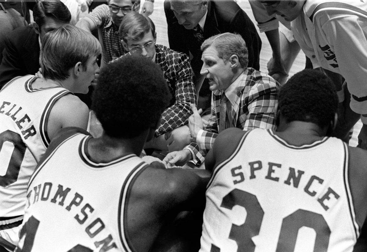 Wolfpack coach Norman Sloan lays out strategy during a time-out in the 1974 ACC Tournament game against Maryland.