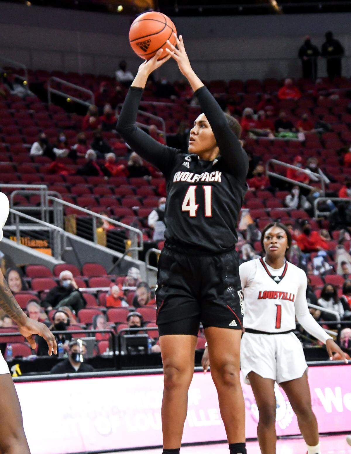 N.C. State’s Camille Hobby (41) shoots during the Wolfpack’s game against Louisville at KFC Yum! Center in Louisville, Ky. Monday, February 1, 2021.