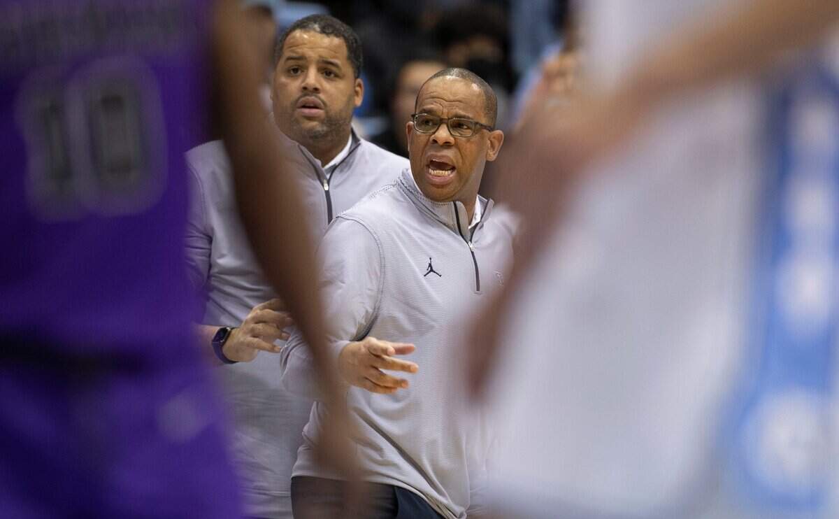 North Carolina coach Hubert Davis directs his player on offense during the second half against Furman on Tuesday, December 14, 2021 at the Smith Center in Chapel Hill, N.C.